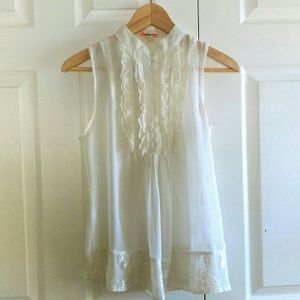 Sheer lacy sleeveless blouse
